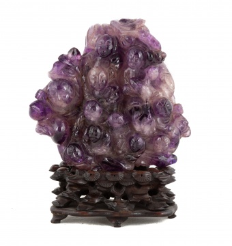 Chinese Carved Amethyst "Thousand Faces"